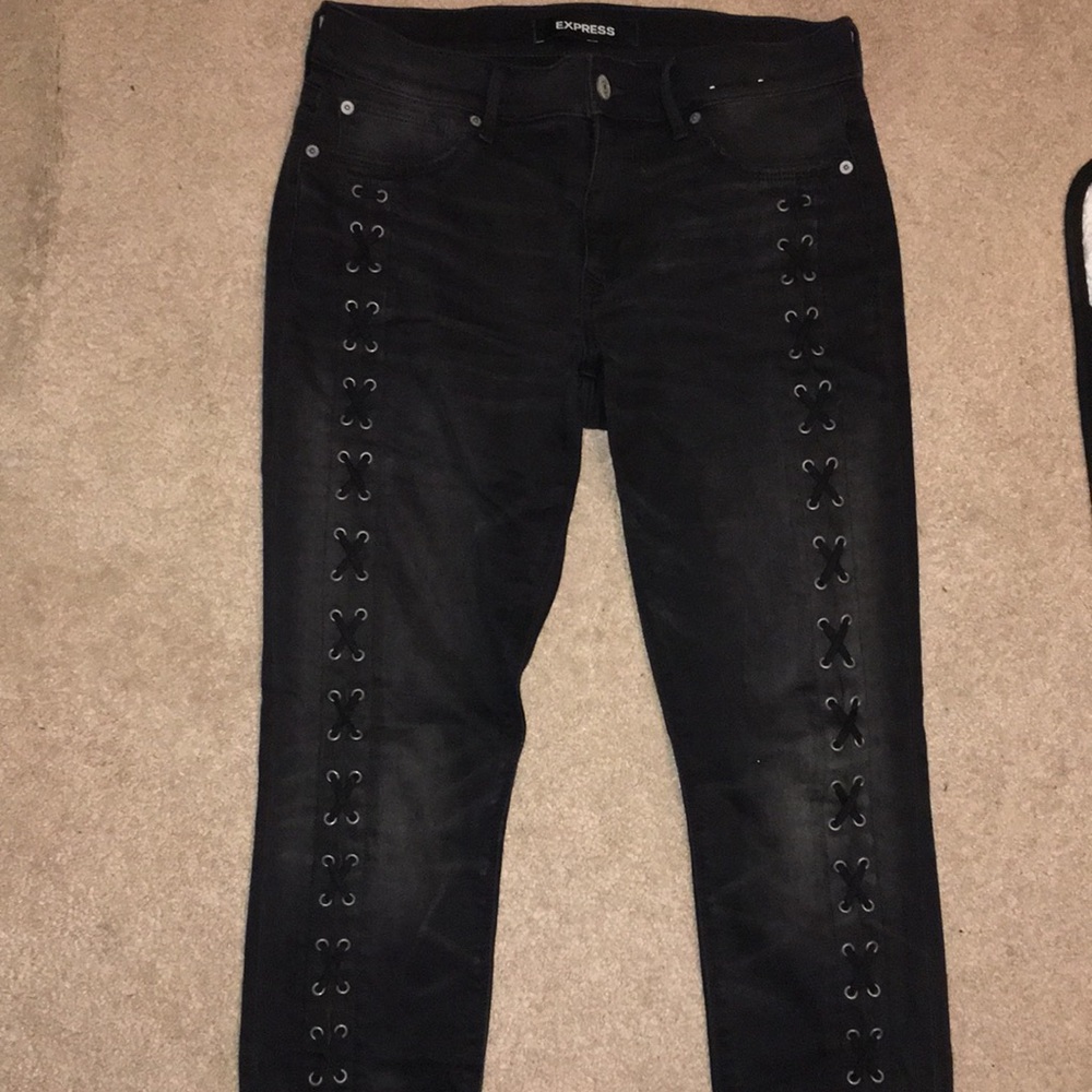 Tied up black denim jeans